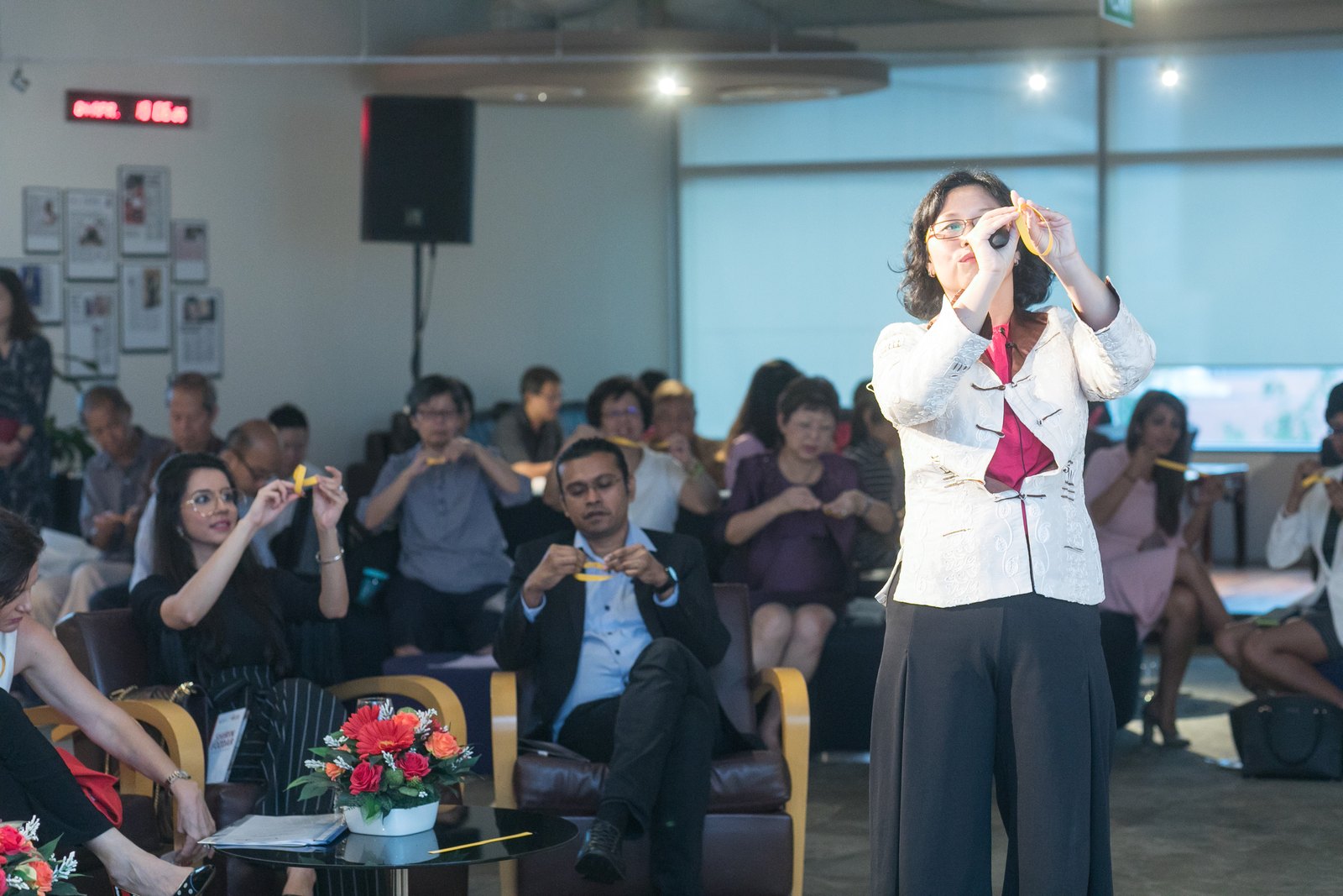 Wendy Tan leading an interactive session with an audience